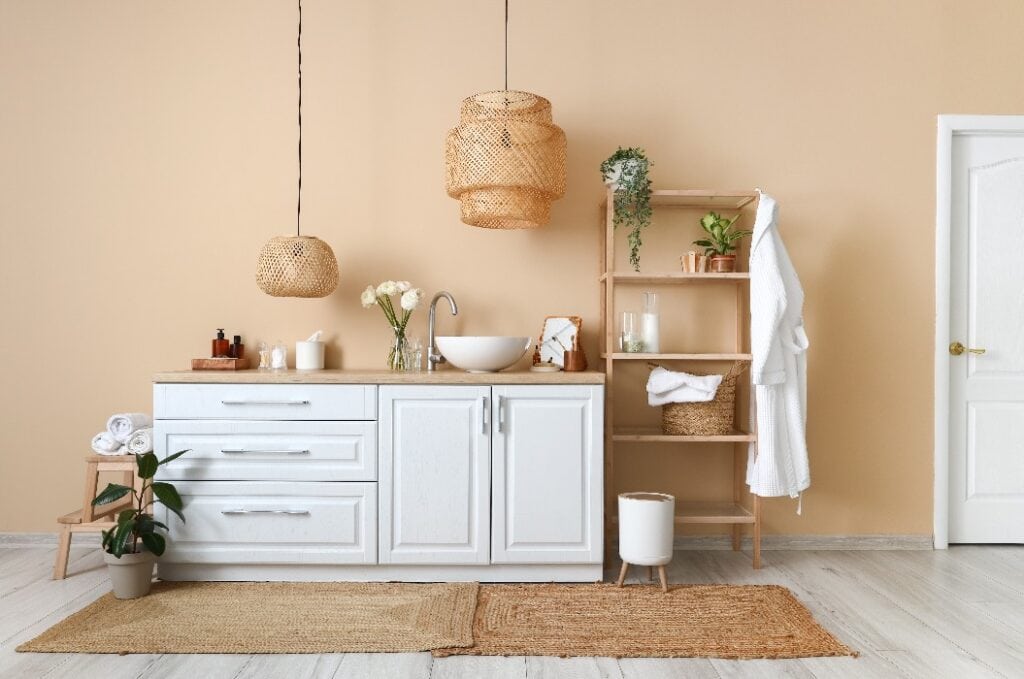 Interior of bathroom with sink, counters and shelving unit